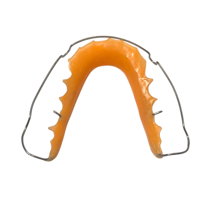 Orange mouthguard with metal frame on a white background